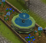 A simple fountain formerly found in Taverley.