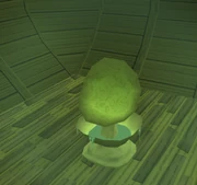 The miniature ectofuntus on a boat at Port Phasmatys docks.