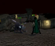 Slaying a dog-woman-thing.