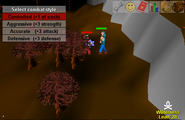 A player fighting a Chaos Dwarf at the bottom of the ridge.