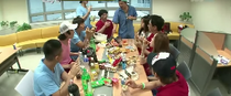 The main cast and guests eating their lunch