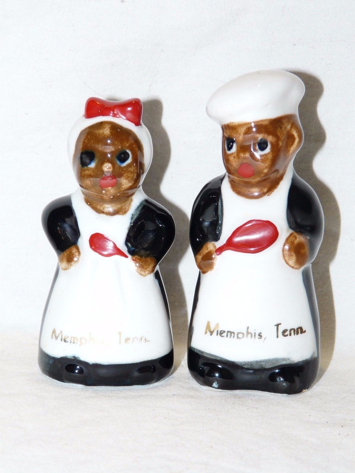 Pair of salt and pepper shakers in form of Mammy and Chef