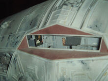 Плакат с девушкой внутри кабины корвета