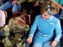 Тик на аттракционе Star Tours.