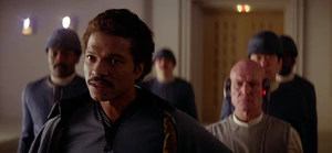 Lando, with Lobot, greets Han Solo.