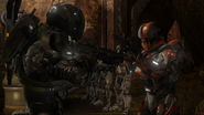 Locus and Felix hold each other at gunpoint