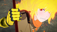 Yang uses her Semblance to take down Adam's Aura at the cost of her own.