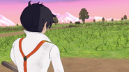 Crossroads in front of the farm, with mountains in the distance