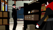 Another of Roman's henchmen pointing a gun at Ruby