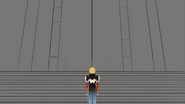 Jaune stands alone, staring at a building.