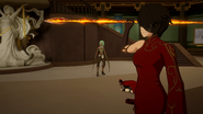 Cinder prepares to throw her spear at Weiss.