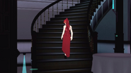 Pyrrha Nikos sadly walks up a flight of stairs