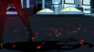 The projectile splatters onto the ground