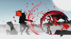 Ruby attacking Beowolves with Crescent Rose
