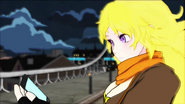 Yang Xiao Long on top of a bridge in Vale, before riding off