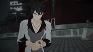 Qrow rubs his wrist.