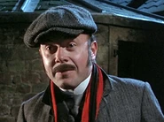 Jonathan Coy als Simpson