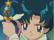 Mercury holding her Crystal Change Rod.