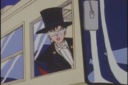 Tuxedo mask in a bus