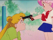 Sailor moon r episode 60 chibiusa pointing a gun at usagi