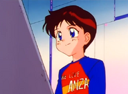 A boywearing the "WE LOVE ANZA" shirt