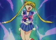 Endymion tortures Sailor Moon in black rose vines.