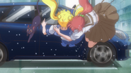 Makoto saves Usagi from being hit