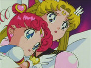 Sailor Moon holding Sailor Chibi Chibi Moon