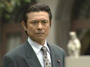 Takeshi jako tata Rei