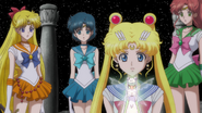 The five Sailor Guardians meet a hologram of Queen Serenity; Usagi's mother in her past life.