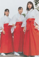 Rei with the other Sailor Guardians wearing shrine priestess clothes.
