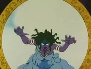 Medusa reflejada en el escudo de Perseo.