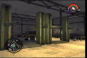 Donnie's second garage as it appears in Saints Row - interior work area car lifts