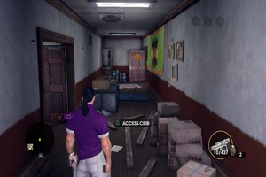 Hallway in Angel's Gym that leads to the storage room, Angel's sleeping area, and garage