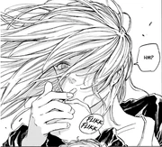 Rion lighting her cigarette