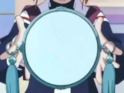 Sakura usa a Espejo para reflejar el ataque de .