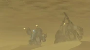 Diana and Rosita fight against three Anubis machines in a sandstorm.