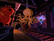 [1] A Tunnel of the Ride. Featuring a sculpture of The New Guinea Pig Leader, The Octopus, and Lactose.