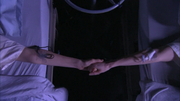 0x05 The Morrígan sisters holding hands