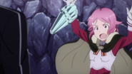 Lisbeth throwing away the ingot