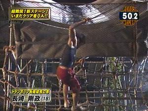 Nagasaki Takamasa attempting Flying Chute in SASUKE 18, Close View