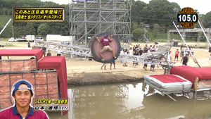 Yamamoto Shingo attempting Rolling Escargot in SASUKE 27
