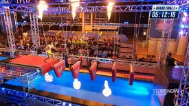 Competitor attempting Australian Ninja Warrior 5's Broken Bridge