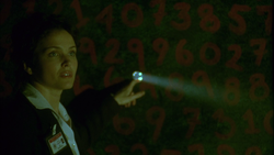 Kerry discovers the peephole.