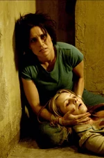 Amanda comforts Laura