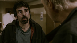 Cecil is confronted by John Kramer