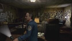 Henry searches Tapp's apartment.