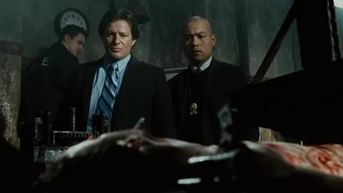 Hoffman and Fisk at Seth's crime scene