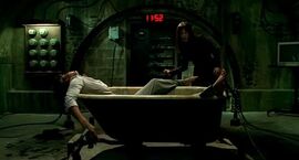 Saw v bathtub trap