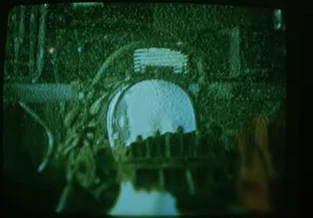 The video demonstrates what happens if Amanda doesn't get the trap off